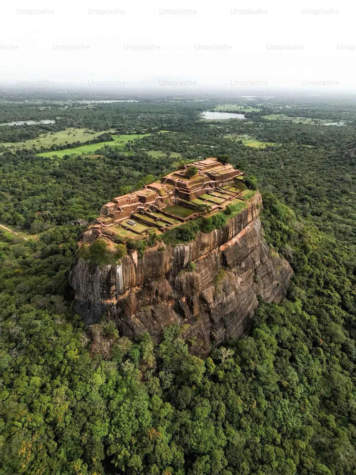 Aerial view of Sigiriya Rock rising above forest in Sri Lanka